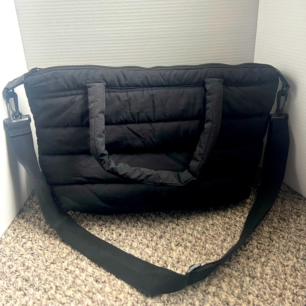 Puffy Tote bag. Use for carry on or work . Used a handful of times